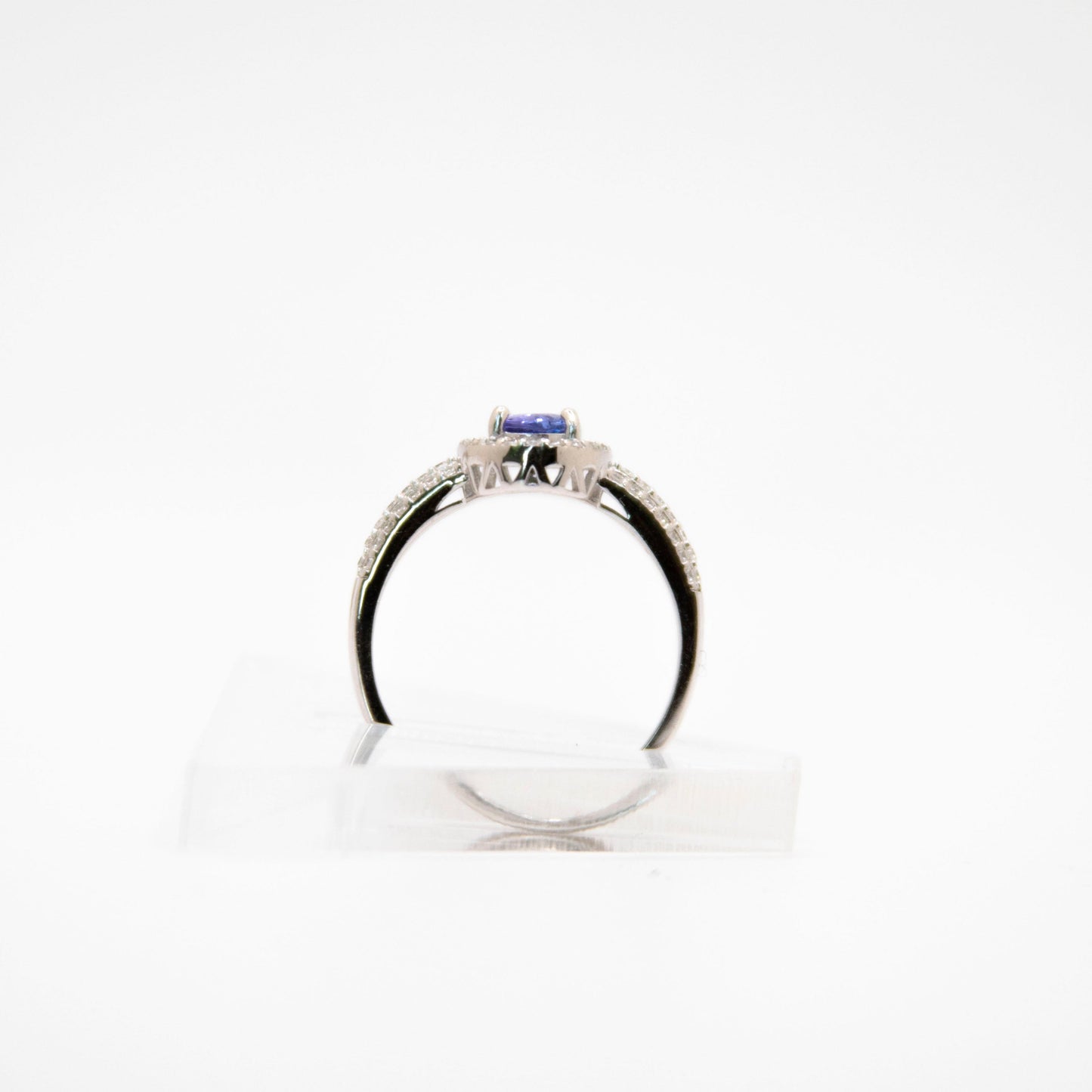 Oval-Cut Tanzanite Ring with CZ Halo