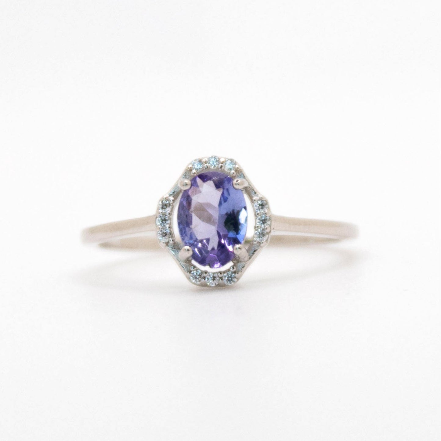 Oval-Cut Tanzanite Ring with CZ Halo