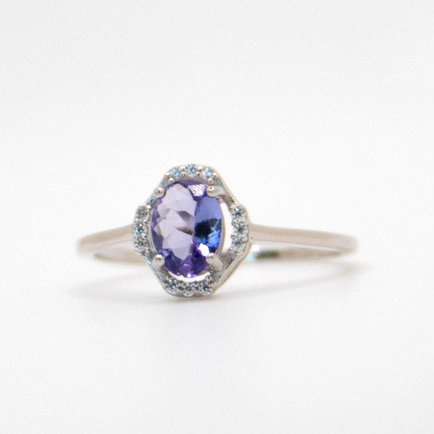 Oval-Cut Tanzanite Ring with CZ Halo
