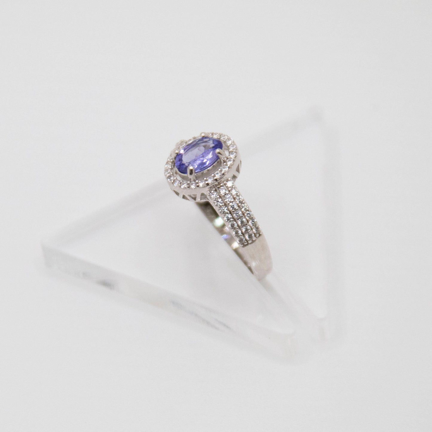 Oval-Cut Tanzanite Ring with CZ Halo