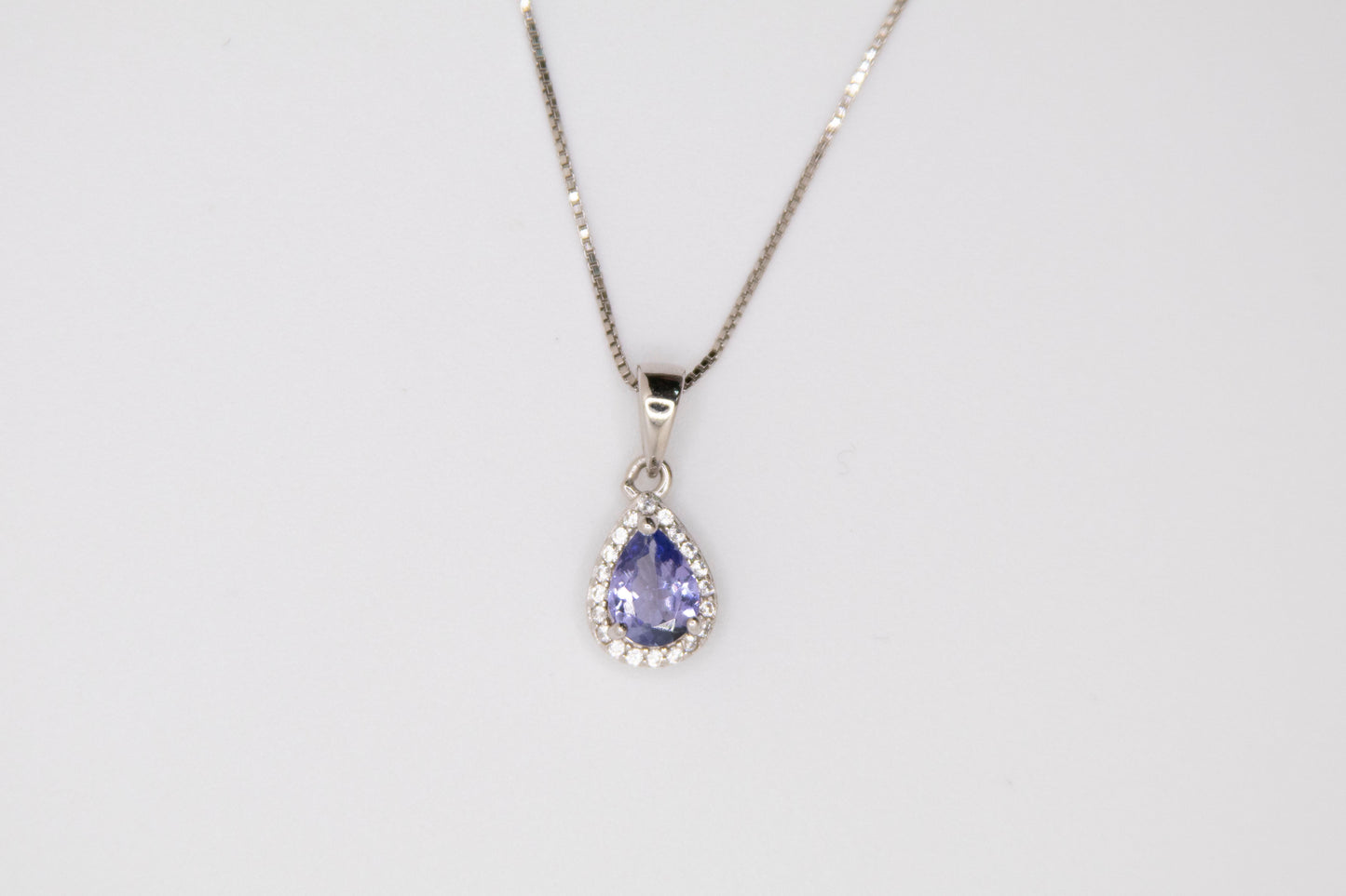 Pear-Cut Tanzanite Halo Pendant Necklace