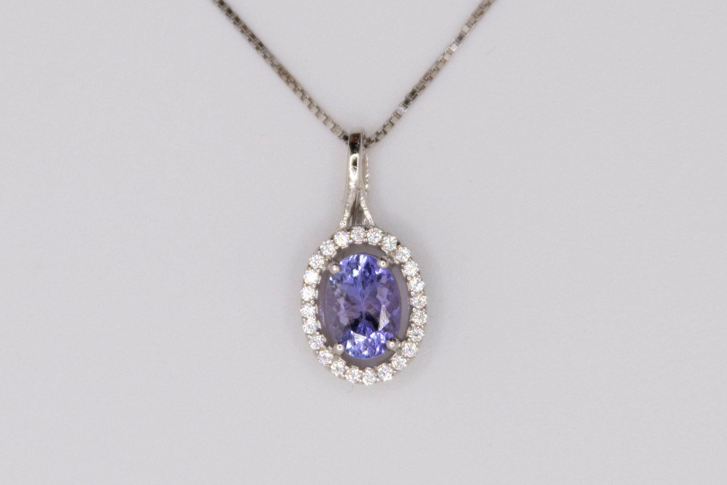 Oval Cut Tanzanite Halo Pendant Necklace