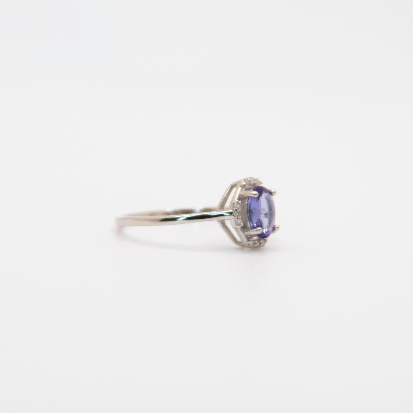 Oval-Cut Tanzanite Ring with CZ Halo