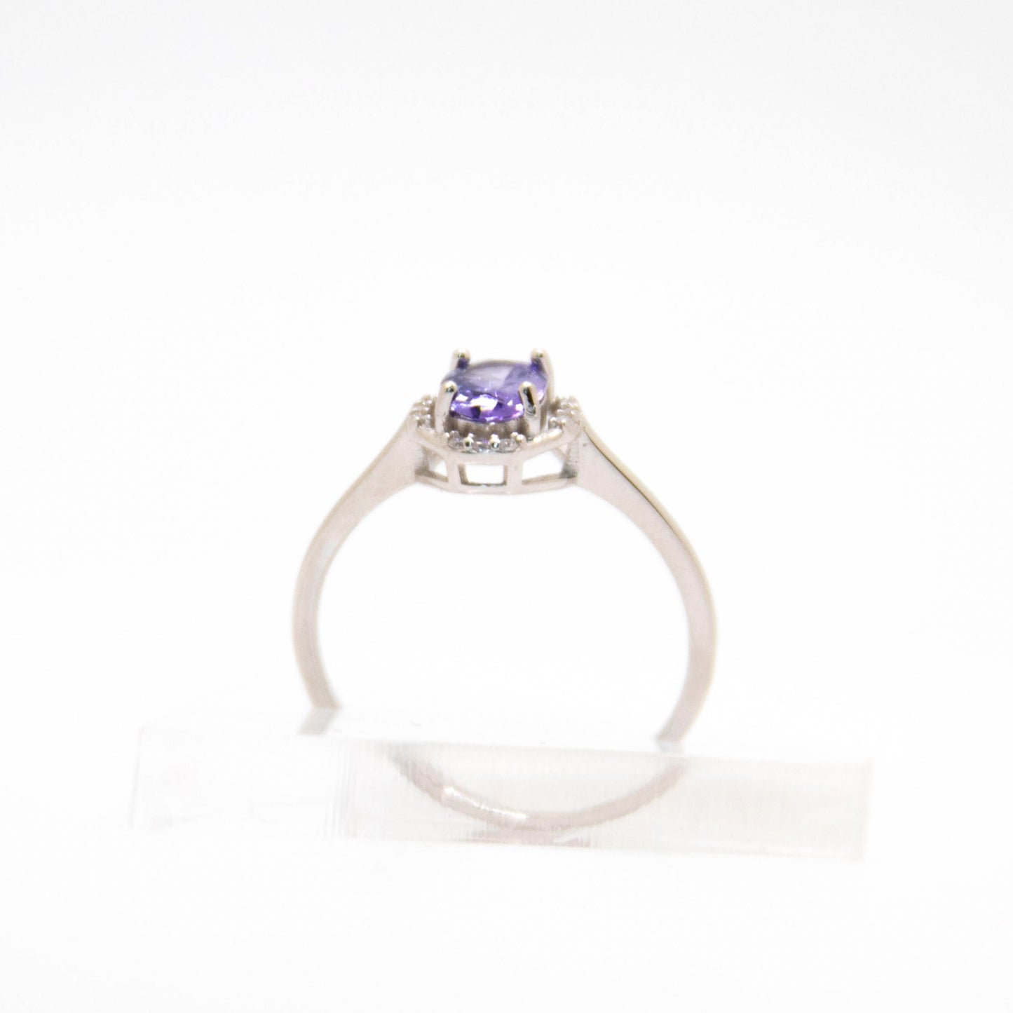 Oval-Cut Tanzanite Ring with CZ Halo