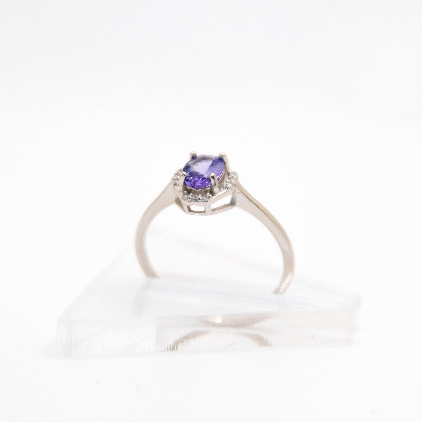 Oval-Cut Tanzanite Ring with CZ Halo