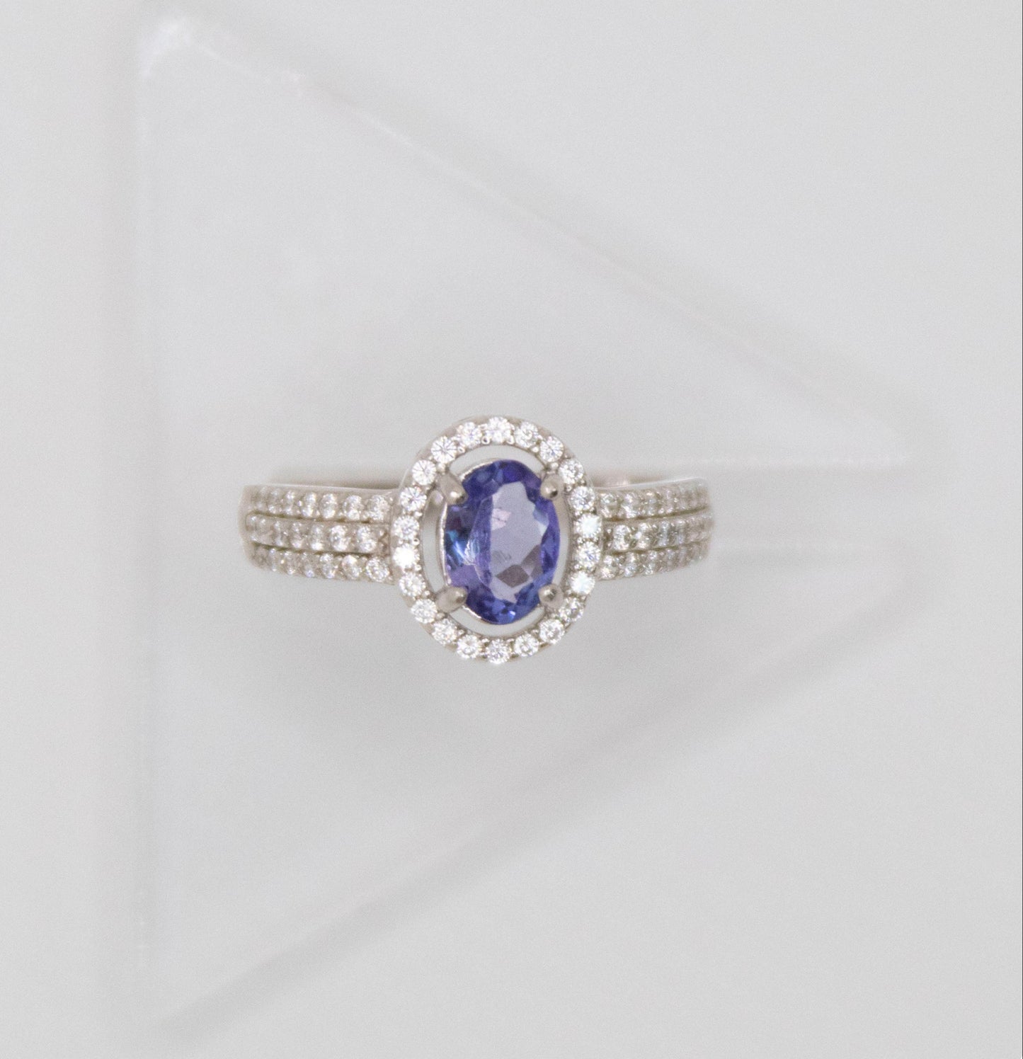 Oval-Cut Tanzanite Ring with CZ Halo