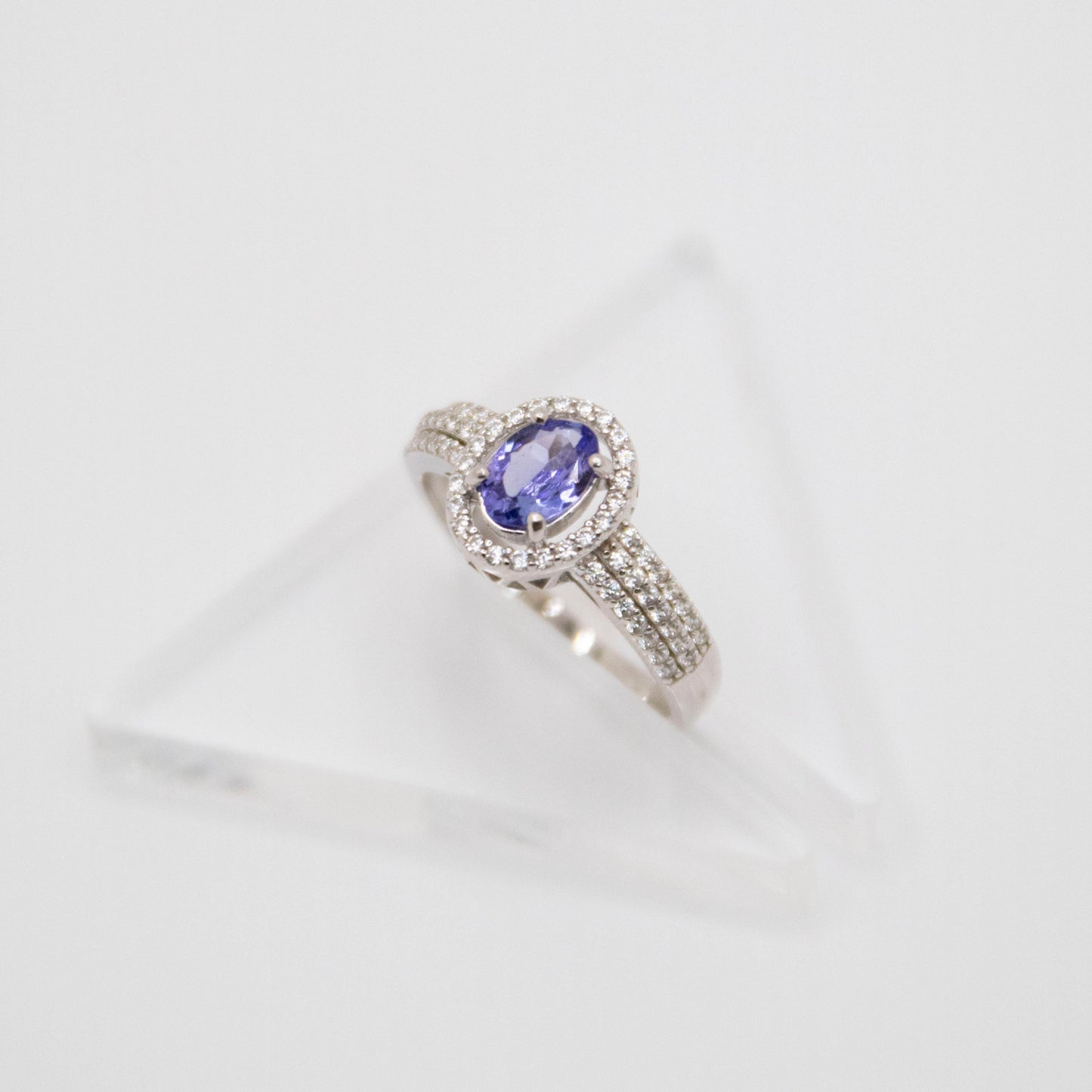 Oval-Cut Tanzanite Ring with CZ Halo